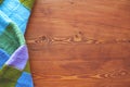 Beautiful waxed wooden background with scarf side view. flat lay top view