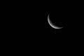 Beautiful Waxing Crescent over a black background