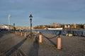 Beautiful weather, ships, harbour, blue sky, old street lamp and shade Royalty Free Stock Photo