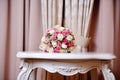 Beautiful wedding boquet lying on table in restaurant Royalty Free Stock Photo