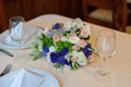 Beautiful wedding boquet lying on table in restaurant Royalty Free Stock Photo