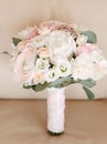 Beautiful wedding bouquet, bridal classic round rosy bouquet, classical wedding, white tendy flowers, close up