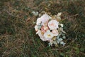 Beautiful wedding bouquet of bride wedding flowers fresh pink roses and alstroemeria bridal decoration. Fresh wedding flowers in Royalty Free Stock Photo