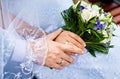 Beautiful wedding bouquet in brides and grooms hands Royalty Free Stock Photo