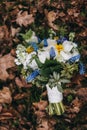 Beautiful wedding bouquet of different white, blue, green flower Royalty Free Stock Photo