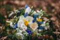 Beautiful wedding bouquet of different white, blue, green flower Royalty Free Stock Photo