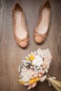 Beautiful wedding bouquet of dry flowers and ballet shoes. Royalty Free Stock Photo