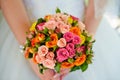 Beautiful wedding bouquet of flowers in hands of the bride Royalty Free Stock Photo
