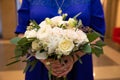 Wedding bouquet of flowers in the hands of the bride Royalty Free Stock Photo