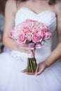 Beautiful wedding bouquet in hands of the bride Royalty Free Stock Photo