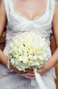 Beautiful wedding bouquet in hands of the bride. Focus Royalty Free Stock Photo