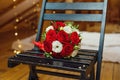 Beautiful wedding bouquet lying on a chair Royalty Free Stock Photo