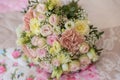 A beautiful wedding bouquet made of roses is