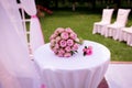 A beautiful wedding bouquet of peony roses, lies on a white table, everything is ready for the wedding ceremony, beautiful pink Royalty Free Stock Photo