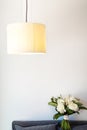 Beautiful wedding bouquet on a sofa. Beige lamp Royalty Free Stock Photo