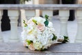 Beautiful wedding bouquet on a vintage marble banister