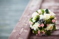 Beautiful wedding bouquet on vintage wooden background. Marriage concept Royalty Free Stock Photo