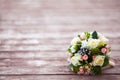 Beautiful wedding bouquet on vintage wooden background. Marriage concept Royalty Free Stock Photo