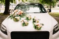 Beautiful wedding car. Front of the luxury car decorated flowers Royalty Free Stock Photo