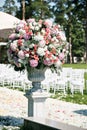 Beautiful wedding ceremony design decoration elements with fresh flowers composition, floral design, petals roses and Royalty Free Stock Photo