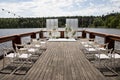 Beautiful wedding ceremony place on the lake with natural materials in white color Royalty Free Stock Photo