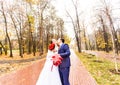 Beautiful Wedding couple kissing in the rain Royalty Free Stock Photo