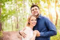 Beautiful wedding couple outside in green forest. Royalty Free Stock Photo