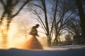 Beautiful wedding couple. Winter wedding of the groom and the bride in a beautiful wedding dress. Winter photo shoot newlyweds Royalty Free Stock Photo