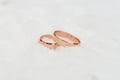 Beautiful Wedding rings on the snow. Soft focus