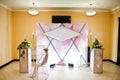 Beautiful wedding set decoration in the restaurant. Luxury photo zone