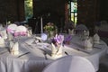 Beautiful wedding table set with purple decorations and lavender Royalty Free Stock Photo