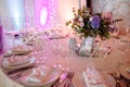 Beautiful wedding table setting with fresh flowers