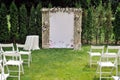 Beautiful wedding trellis decorated with flowers and congratulation on banner Royalty Free Stock Photo