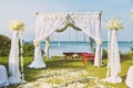 Beautiful beach wedding flower arch setting for wedding venue with panoramic ocean view Royalty Free Stock Photo