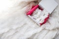 Beautiful wedding white bridal garter. Wedding day moments Royalty Free Stock Photo