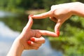 Beautiful well-groomed female hands frame the space. Royalty Free Stock Photo