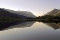Beautiful Welsh Mountains reflected in a still waters of lake Llyn Padarn, Llan Beris Wales Royalty Free Stock Photo