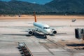 Beautiful white airplane on the runway in Dalaman airport