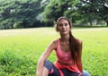 Caucasian woman sport smile portrait and sitting relaxation in the garden.