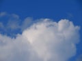 Beautiful white cloud against a blue sky in winter in Israel. Close-up nature.