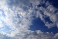 Beautiful white cloud formations in a deep blue sky on a sunny day Royalty Free Stock Photo