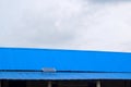 Beautiful white cloud on the sky through the roof of a tin shed building