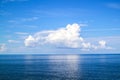 beautiful white clouds on blue sky over calm sea Royalty Free Stock Photo