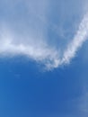 The white clouds on the blue sky are perfect for the background. Skyscape on Lombok Island, Indonesia Royalty Free Stock Photo