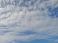 The white clouds on the blue sky are perfect for the background. Skyscape on Lombok Island, Indonesia Royalty Free Stock Photo