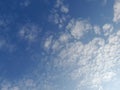 The white clouds on the blue sky are perfect for the background. Skyscape on Lombok Island, Indonesia Royalty Free Stock Photo