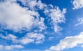 Beautiful white clouds in a tranquil blue summer sky