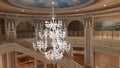 Beautiful white crystal chandelier in the Ritz Carltone Hotel