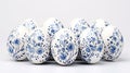 Beautiful white easter eggs decorated with blue flowers. Delft blue eggs