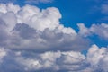 White fluffy clouds against a blue sky